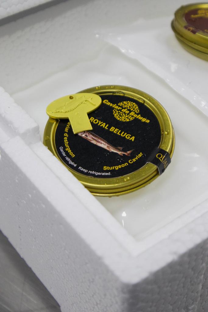 Royal Beluga tin in insulated styrofoam cold-chain packaging